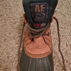 Duck boots. Women's 7 . Tan and hunter green
